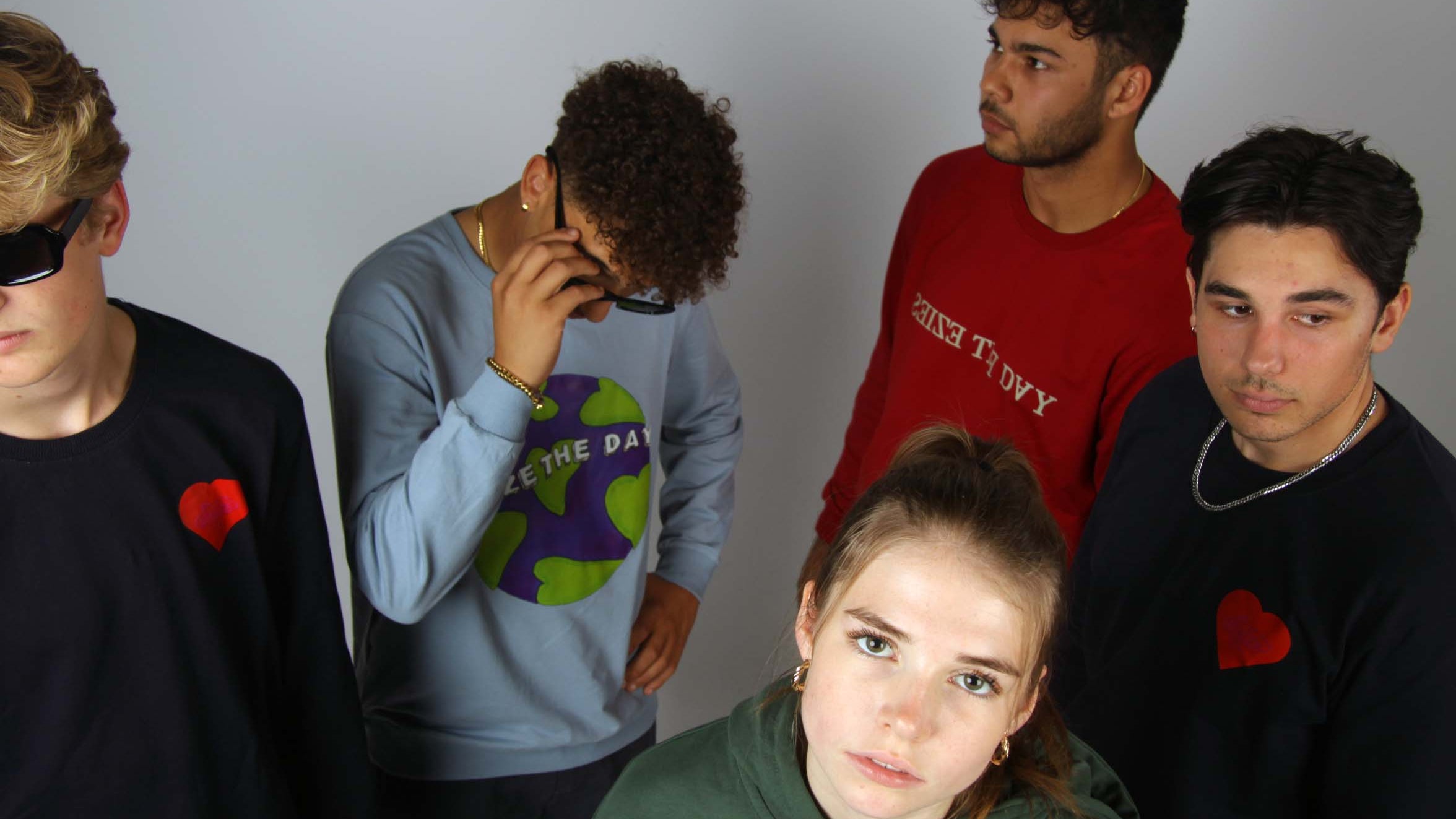 Groepsfoto van modellen voor collectie I van Seize the Day